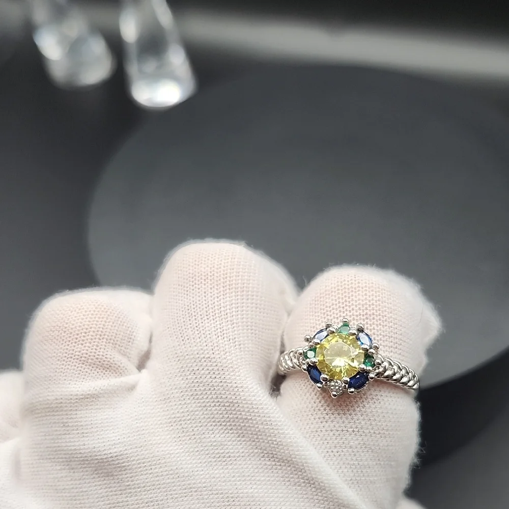 Elegant Silver Ring with Yellow and Blue Stones